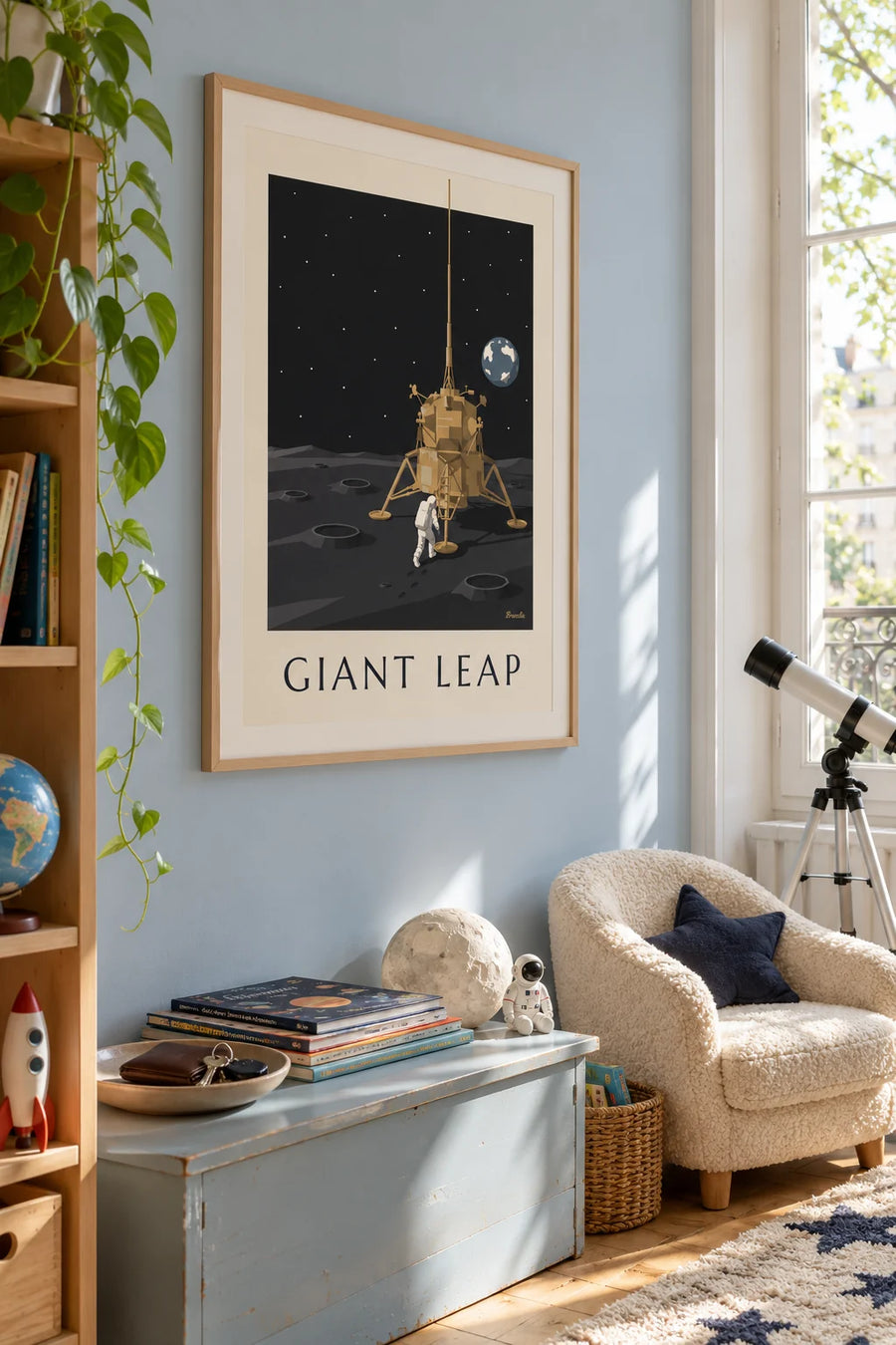 Poster of an astronaut walking toward the lunar module on the Moon: framed on the wall