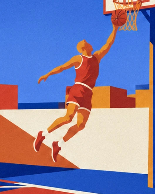 Le basketteur en tenue rouge s'élance vers le panier, ballon au bout du bras