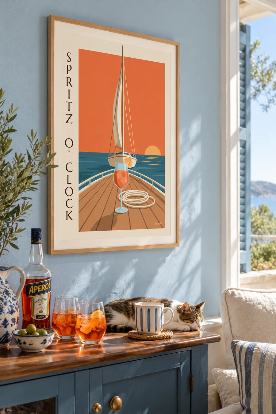 Affiche spritz sur le pont d'un voilier au coucher du soleil : encadrée au mur