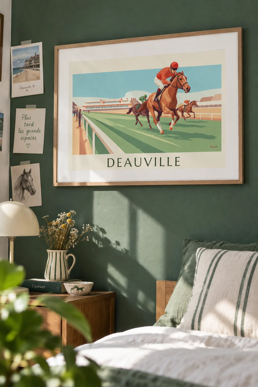 Poster of the Deauville racecourse and galloping horses: framed on the wall