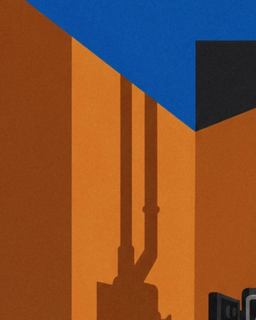 Les 2 conduits sombres le long du mur orange, sous le plafond bleu