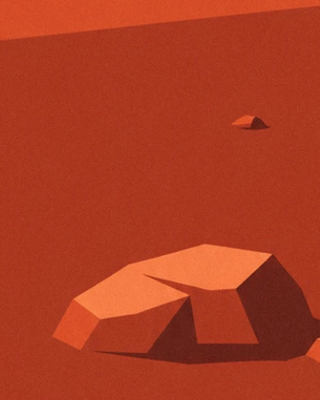 Un rocher anguleux aux facettes orange et rouge sombre sur le sol de Mars