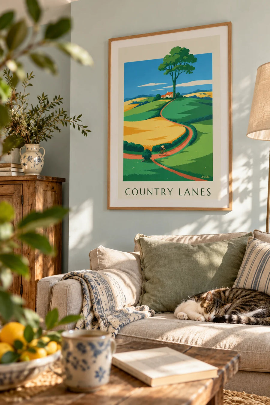 Bike ride poster through rolling countryside: framed on the wall