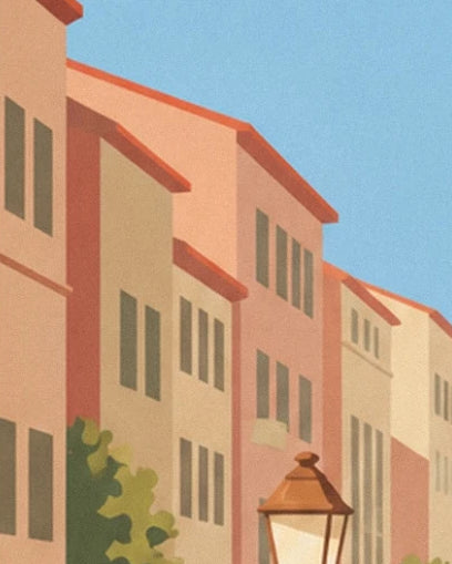 The ochre and pink façades with green shutters, with a street lamp beside the houses