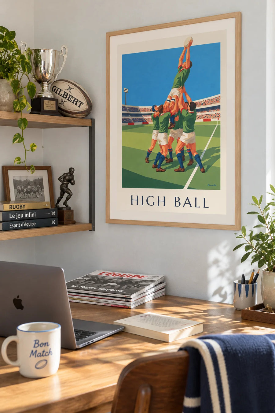 Poster of a rugby player jumping in a lineout to catch the ball: framed on the wall