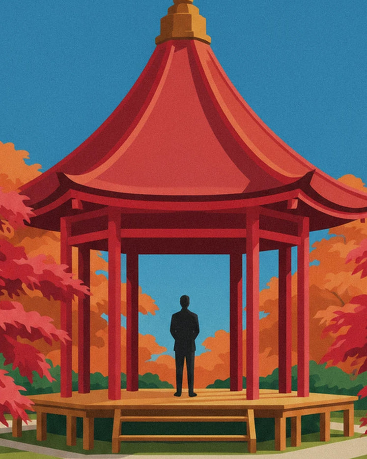 Un personnage sous le pavillon rouge, entouré d’érables aux couleurs d’automne