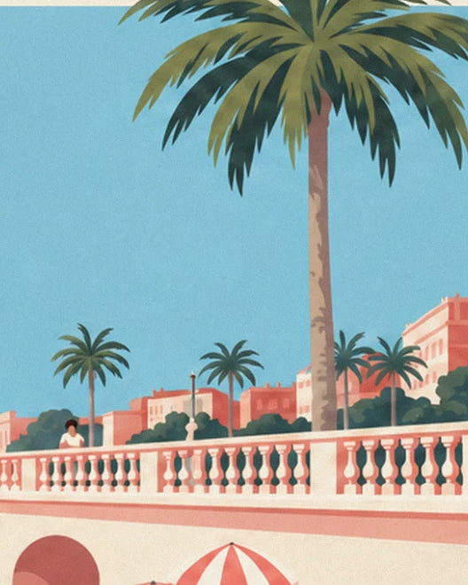 Tall palm tree and pink promenade balustrade, with ochre buildings behind