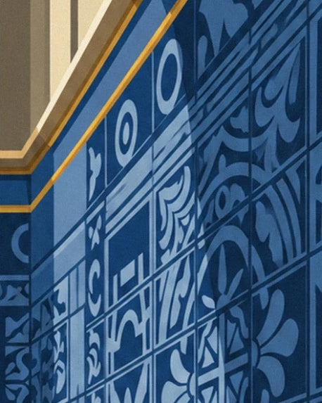 The blue azulejos with curved patterns beneath a cornice edged in gold