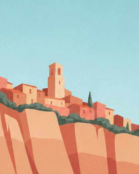 The bell tower and pink houses on the cliff edge, with a cypress beneath the blue sky