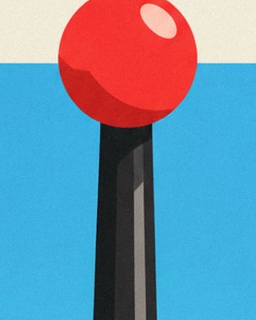 La boule rouge du joystick et son reflet rose sur une tige noire facettée