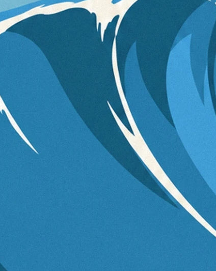 The towering curve of the blue wave and its long trails of white foam