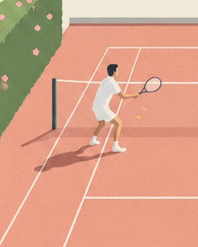 The player in white with a racket held out near the net on the clay court