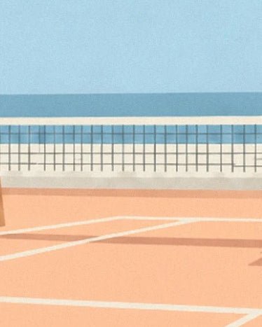 The tennis net and white lines of the orange court against a blue background