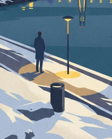 A figure in a dark coat near the street lamp and bin on the snowy quay