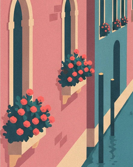 The red geraniums at the window of a pink façade, by the water
