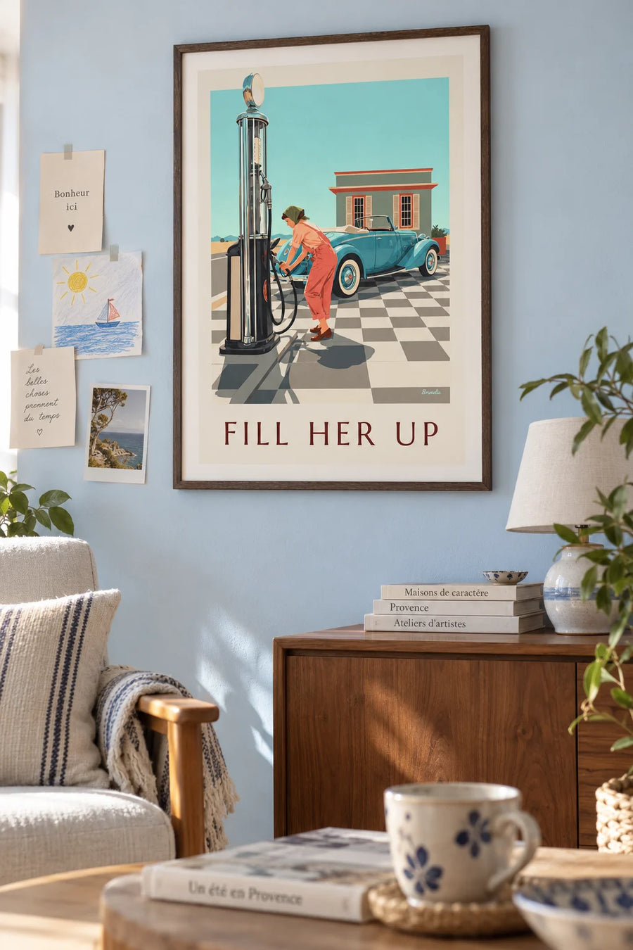 Poster of a pin-up at the gas station next to the gas pump: framed on the wall