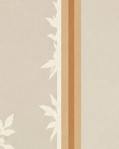 White frost leaves on the grey glass, beside the golden window frame