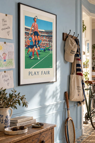 Female soccer player Play Fair heading the ball in a stadium poster: framed on the wall
