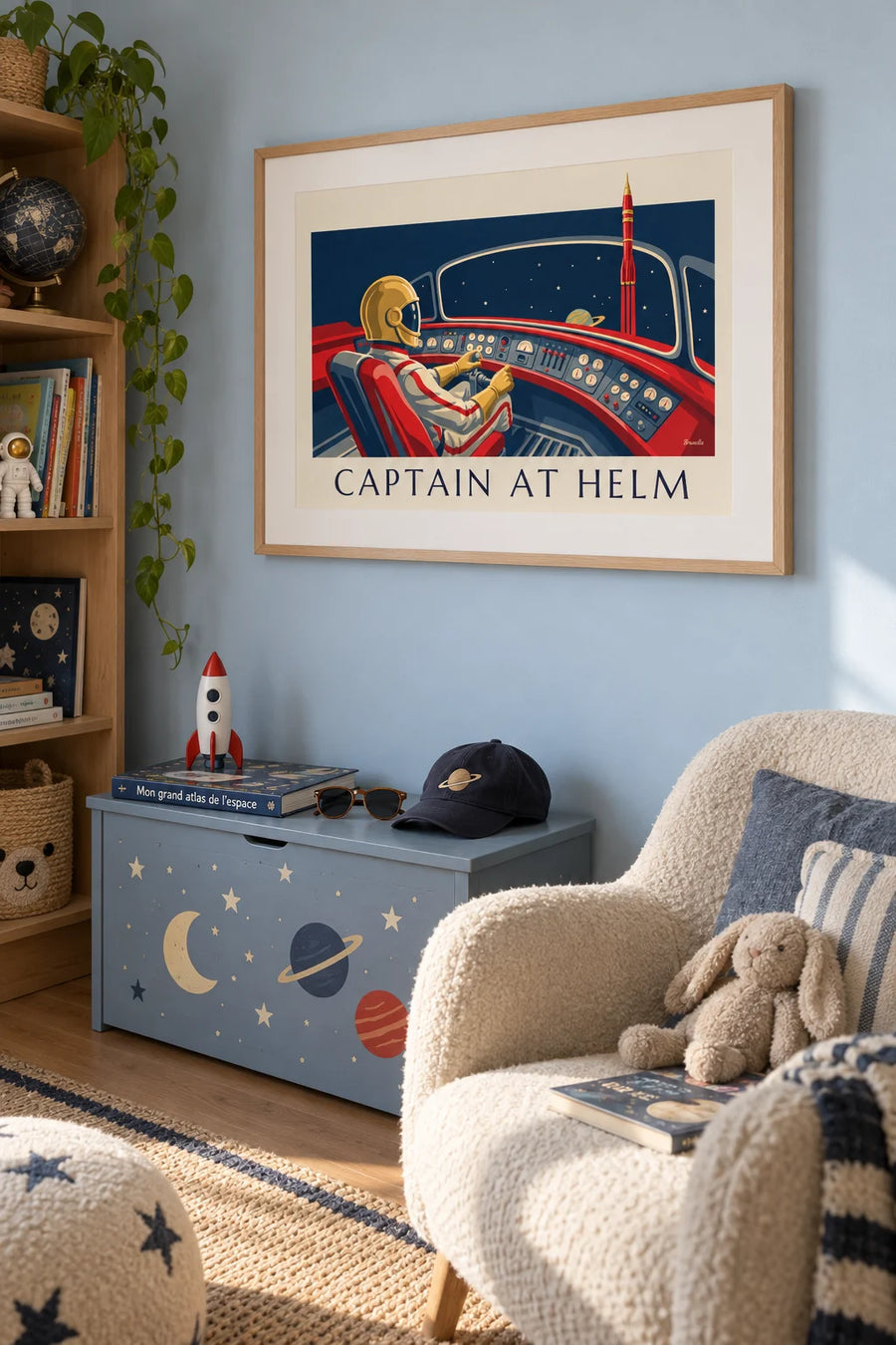 Poster of a helmeted pilot at the controls of a space rocket: framed on the wall