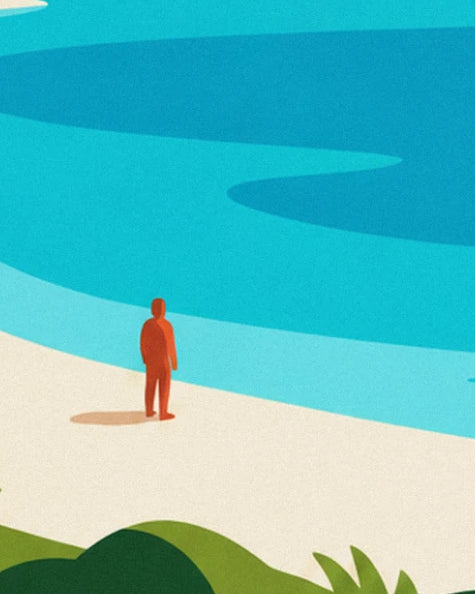 The orange figure standing on the white sand facing the turquoise lagoon