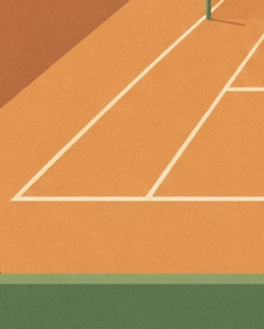 The white lines of the orange clay court bordered by green