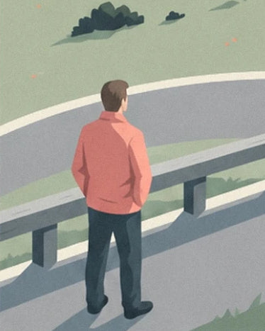 Un homme de dos en veste rouge et pantalon sombre devant la glissière de sécurité