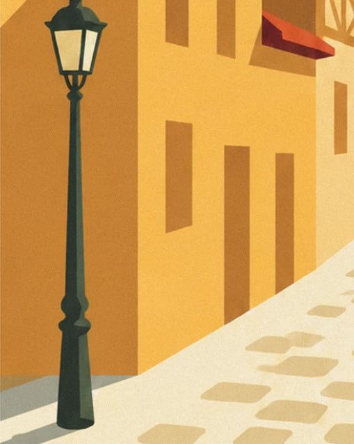 The dark green street lamp in front of an ochre façade, beside the pale cobbled lane