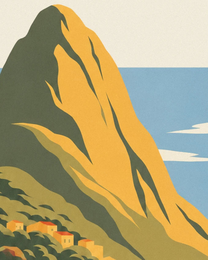 The golden mountain with green slopes plunging into the blue sea, with a few houses at its foot