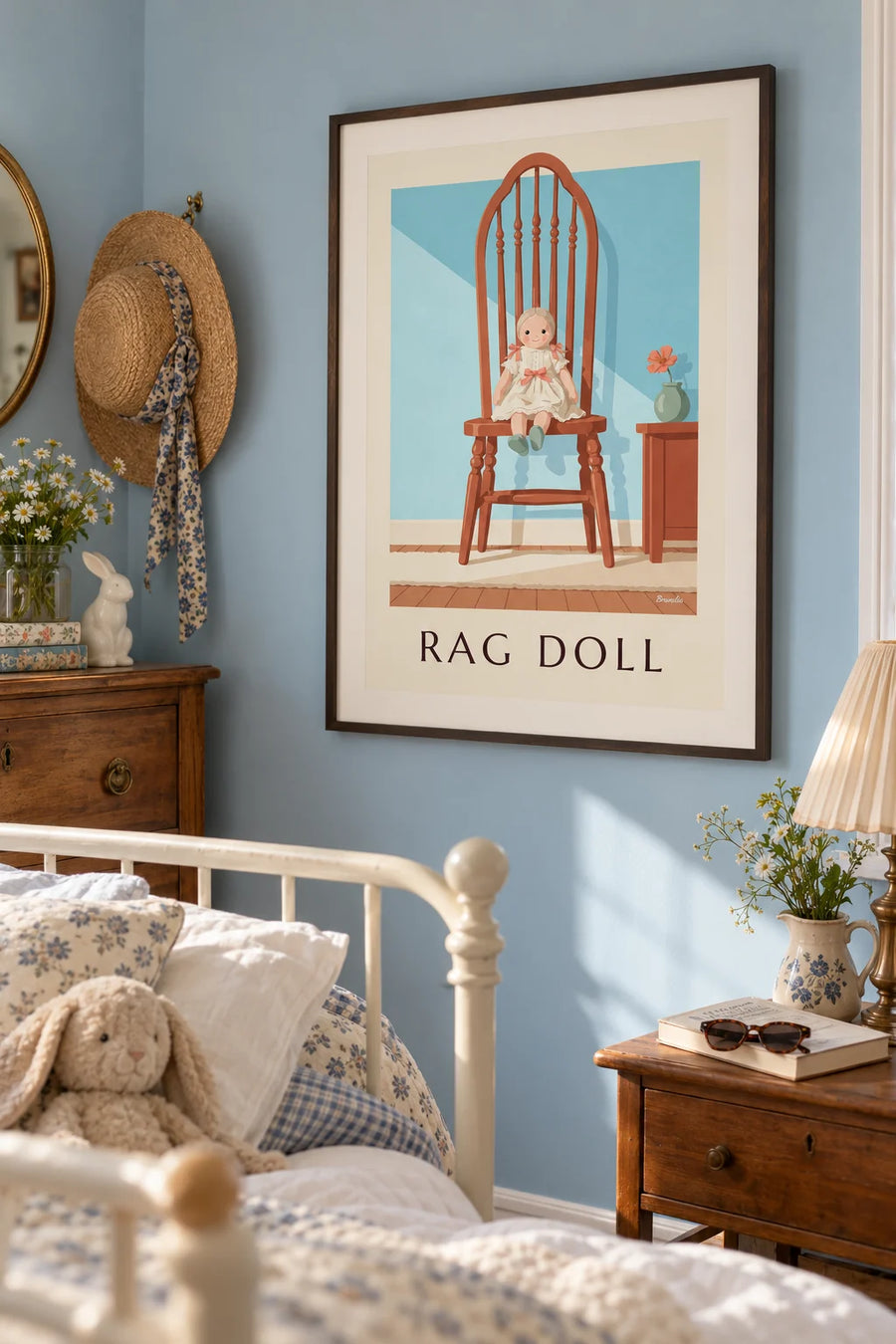 Rag doll on a child’s chair poster: framed on the wall