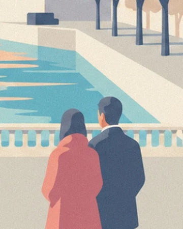 A couple seen from behind in coral and blue coats in front of the quay’s balustrade