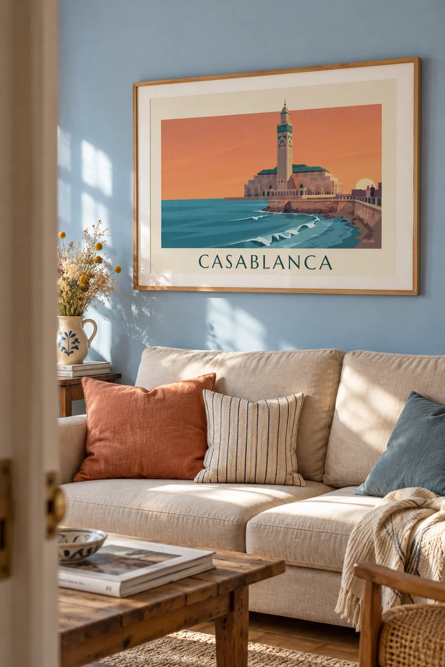 Poster of the Hassan II Mosque facing the ocean at sunset: framed on the wall