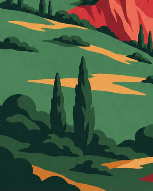 The 2 cypress trees and green scrub on the hill, with ochre paths and red rock in the distance