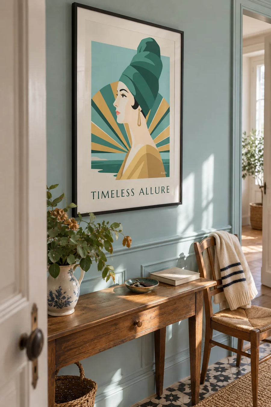 Poster of a woman in a turban and long earrings: framed on the wall