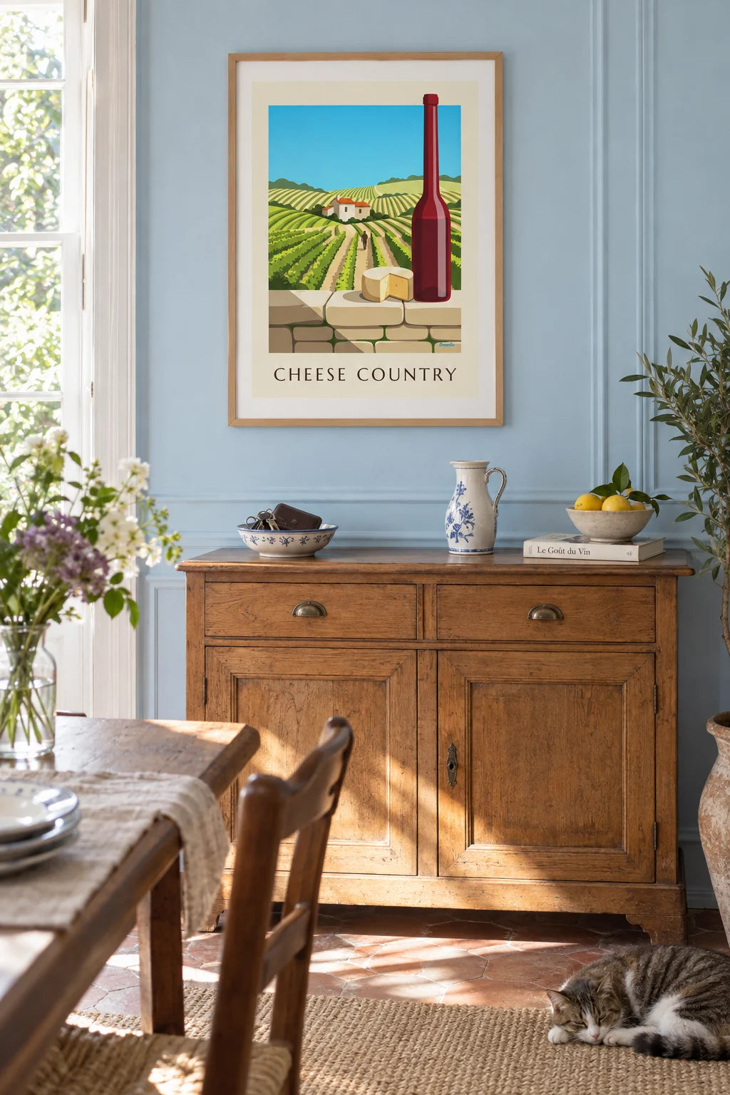 Farmhouse cheese and red wine before the vineyards poster on the wall