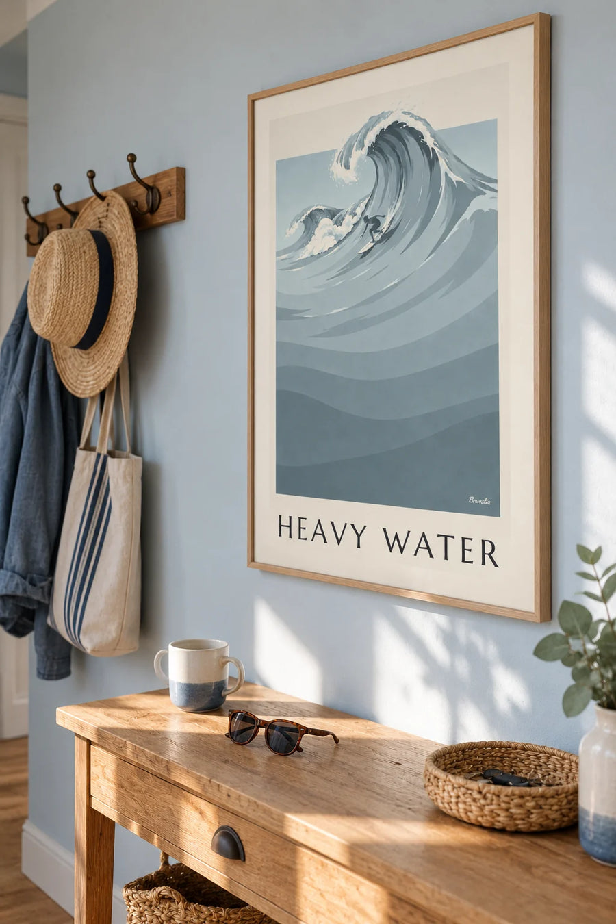 Surfer and giant wave in gray-blue monochrome poster: framed on the wall