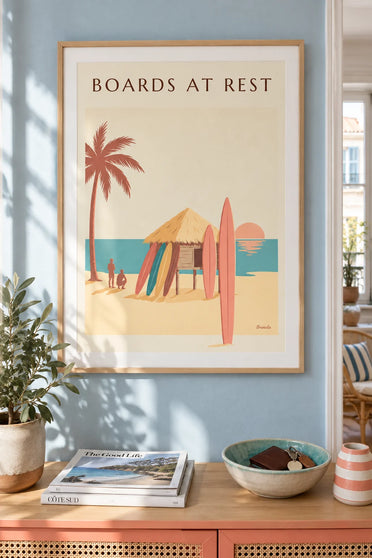 Poster of surfboards leaning against a beach hut at sunset: framed on the wall