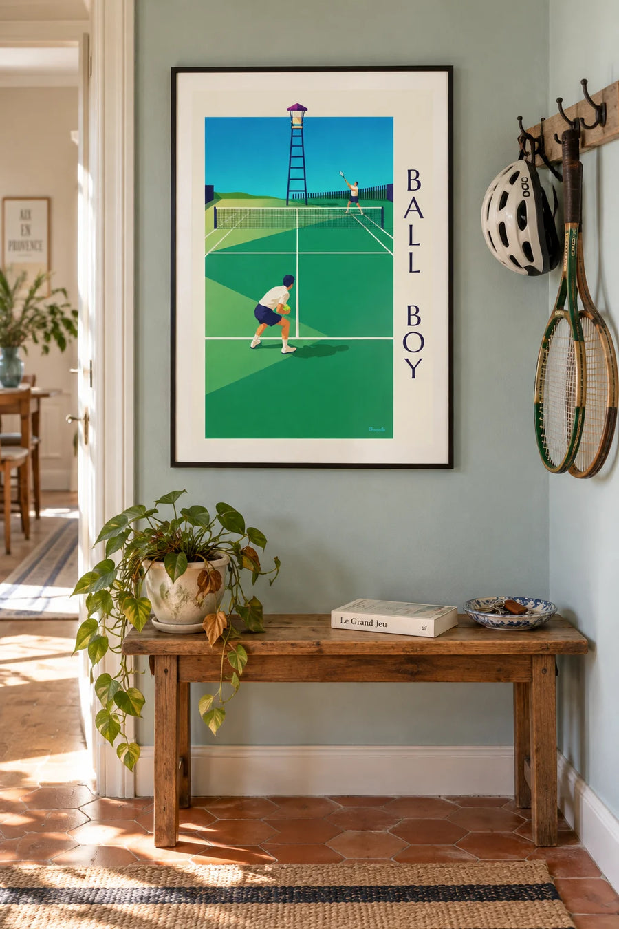 Poster of a ball boy on the tennis court: framed on the wall